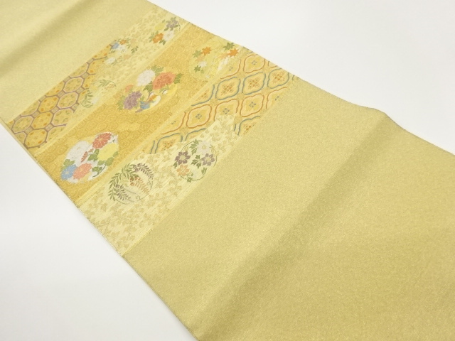 横段に花輪・鴛鴦・古典柄模様織出し袋帯